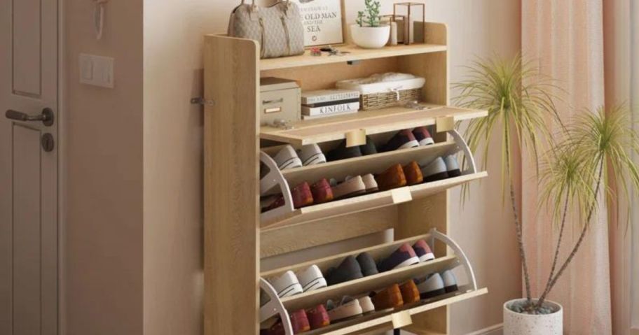 A Rosdorf Park 20 Pair Shoe Storage Cabinet with the drawers pulled open