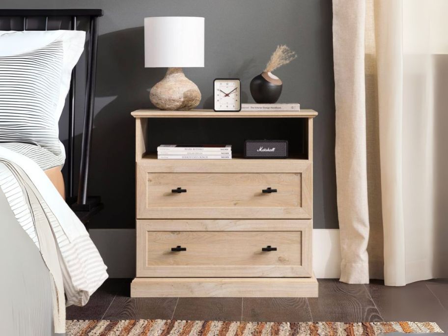 Welwick Designs Farmhouse 2-Drawer Nightstand next to bed