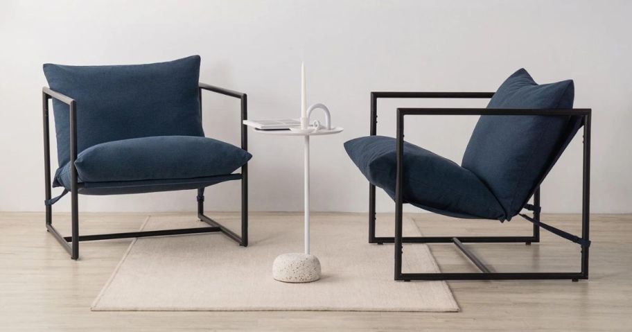 2 navy chairs in a living room