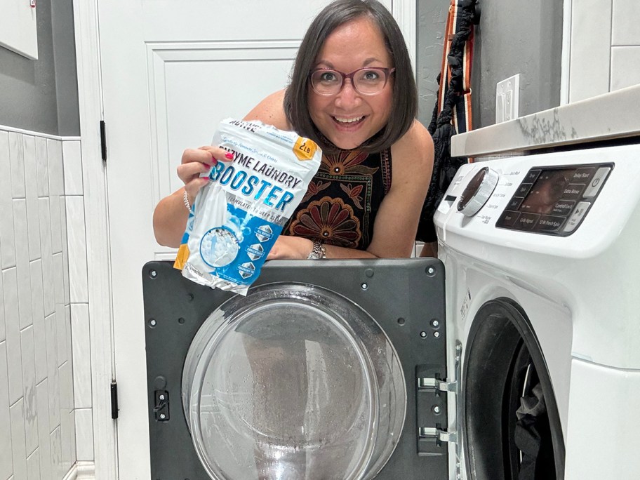 woman holding active enzyme laundry booster bag 