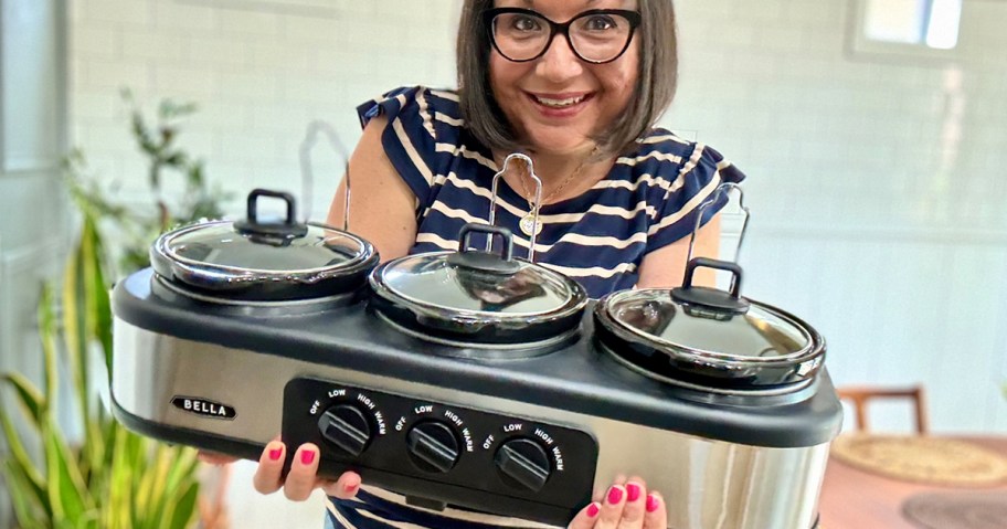 lina holding triple slow cooker