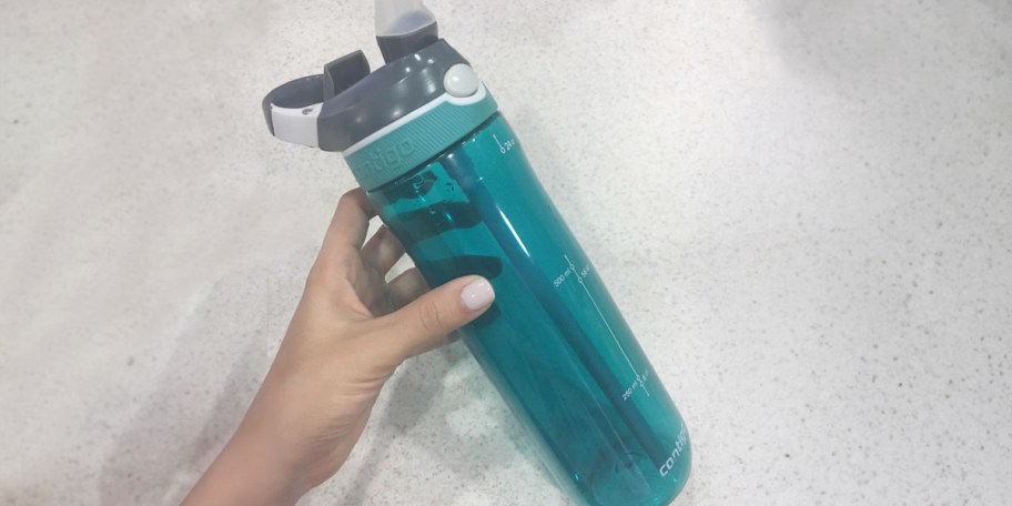 hand holding teal contigo water bottle 