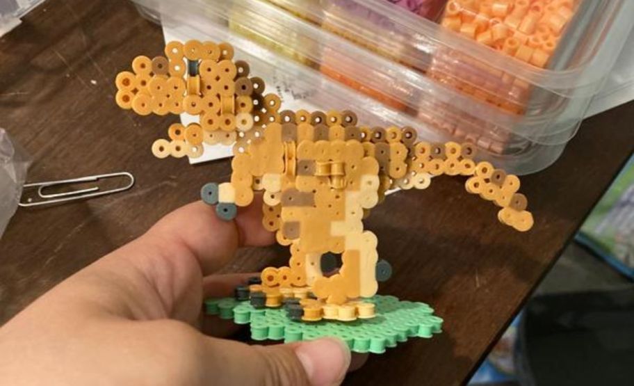 a perler bead dinosaur