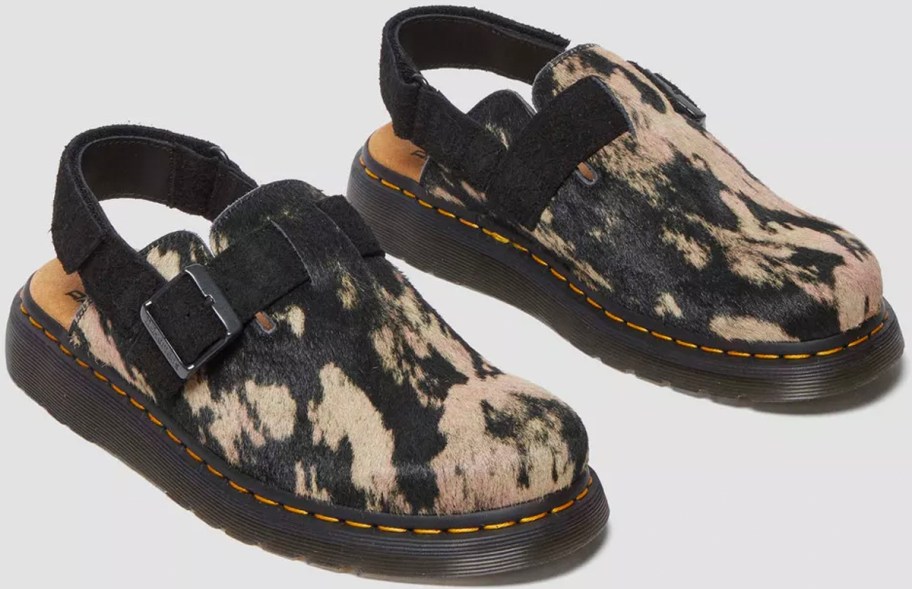 black and white dr marten mules 