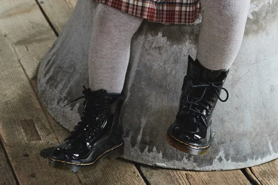 toddler in patent leather boots