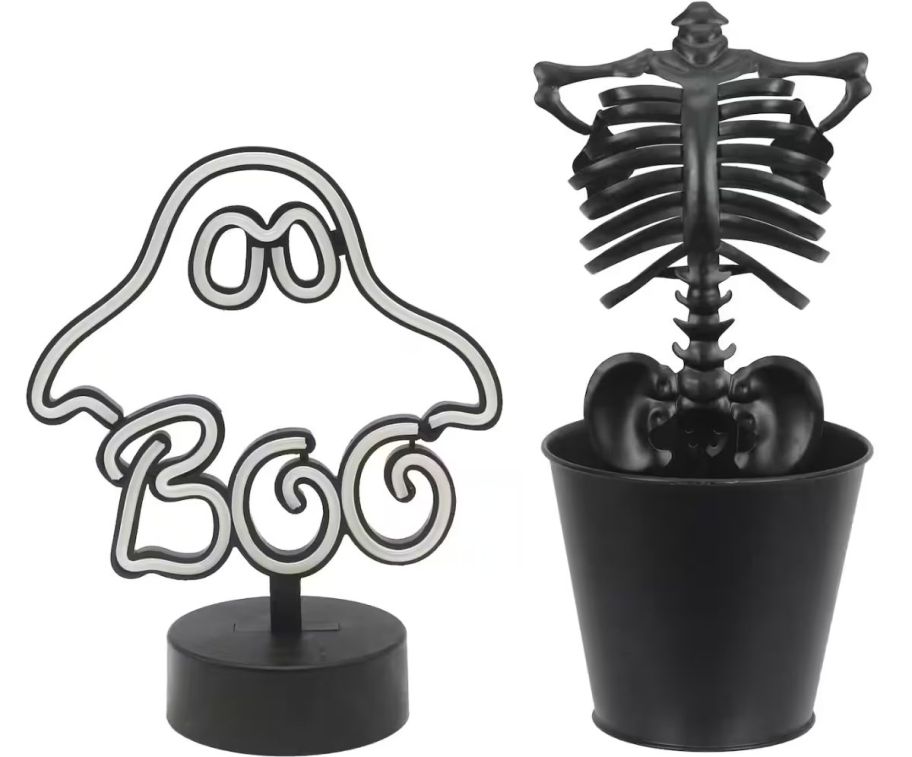 ghost boo led light shown with black metal skeleton planter on white background