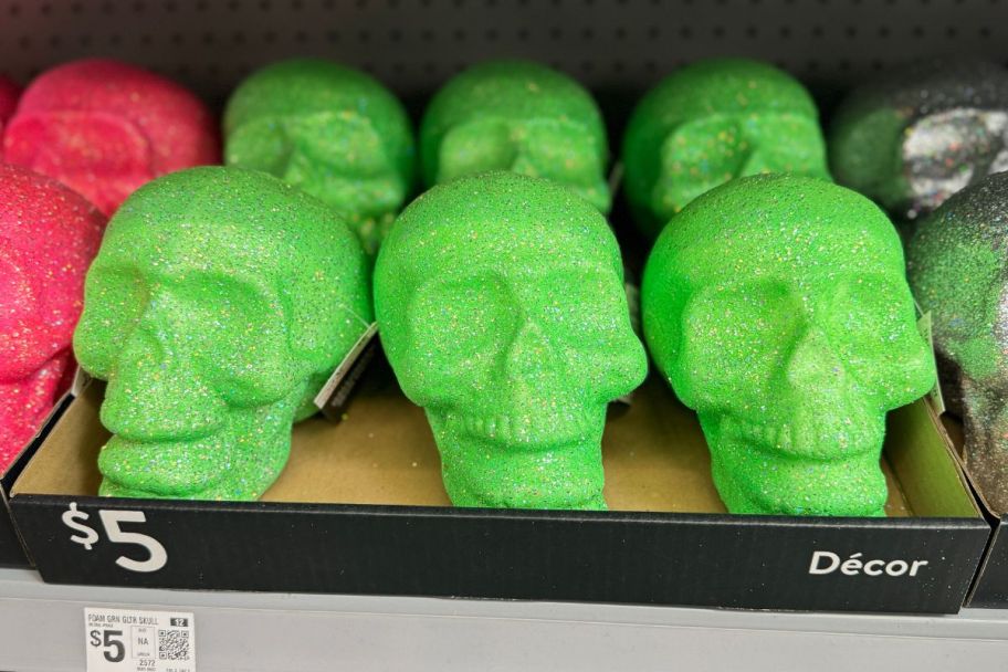 green glitter foam skulls on a store shelf