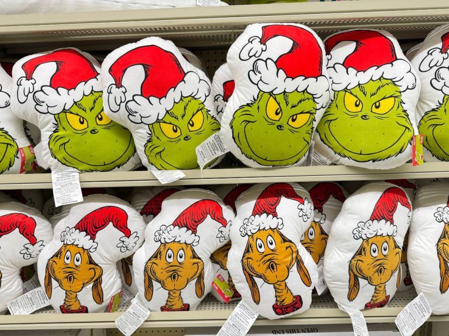 grinch and max pillows on display in store