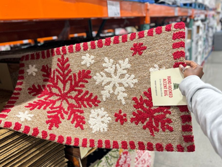 hand hooked Christmas doormat displayed at the store