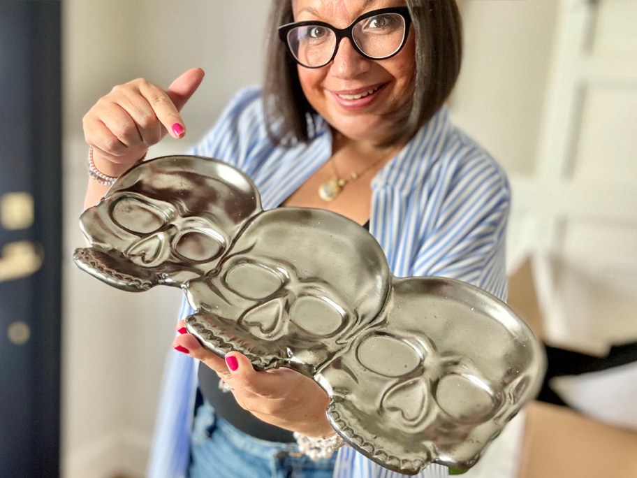 woman holding skeleton platter