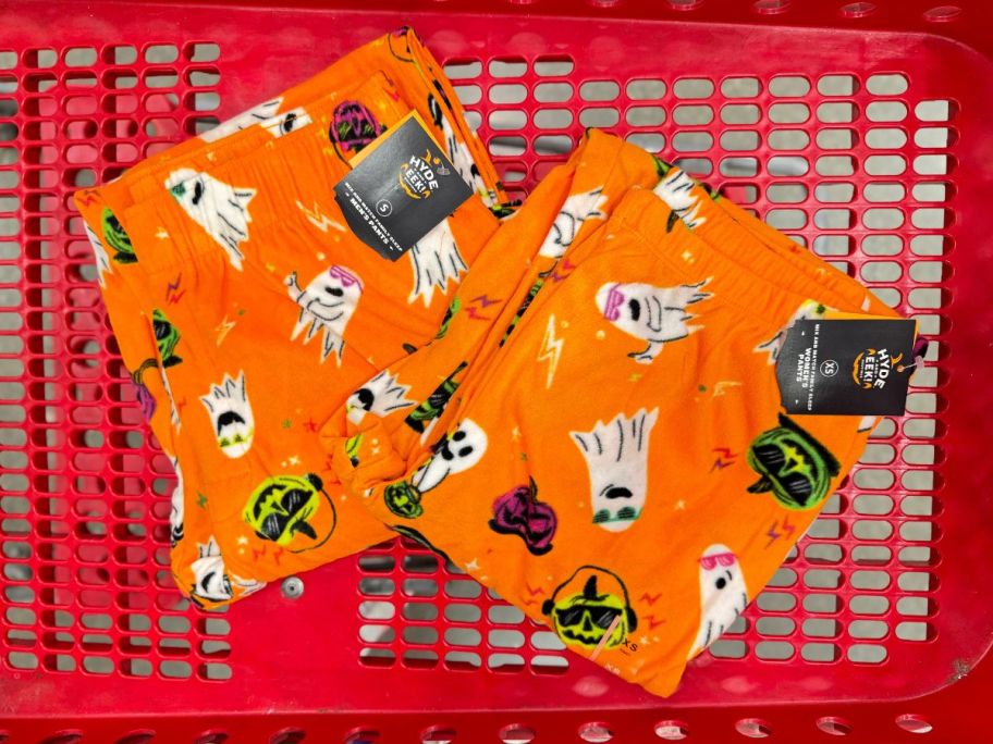 adult pajamas tees hanging on the side of a target cart