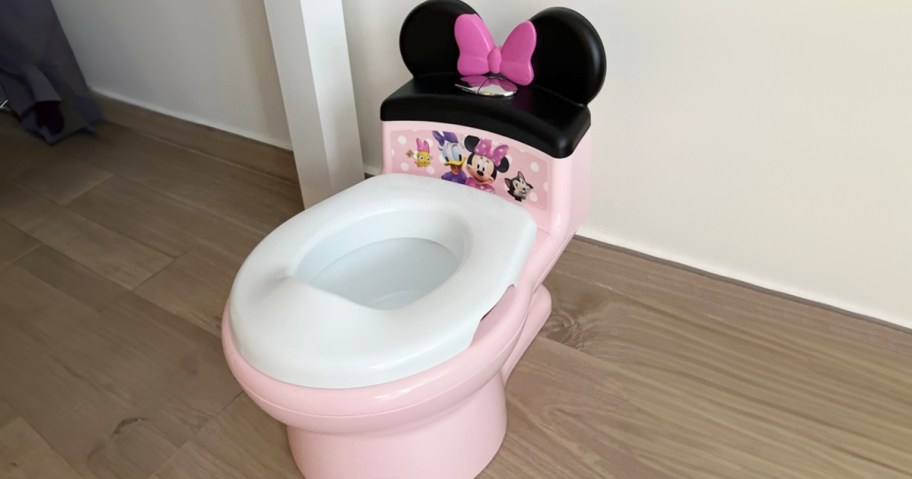 pink and white minnie mouse potty training toilet 