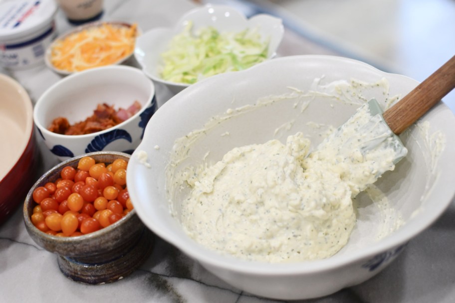 mixing blt dip in a bowl