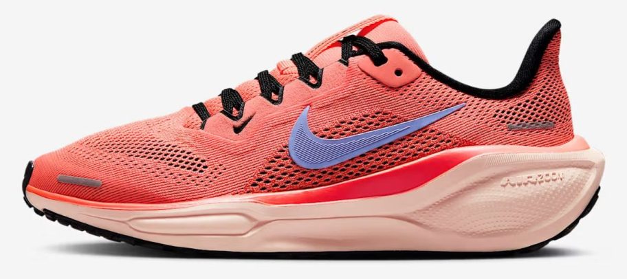 pink and blue Nike Pegasus 41 Big Kids' Road Running Shoe stock image