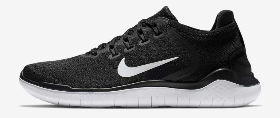 black and white Nike Free RN 2018 Women's Running Shoe stock image