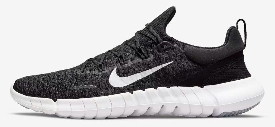 black and white Nike Free Run 5.0 Men's Road Running Shoe stock image