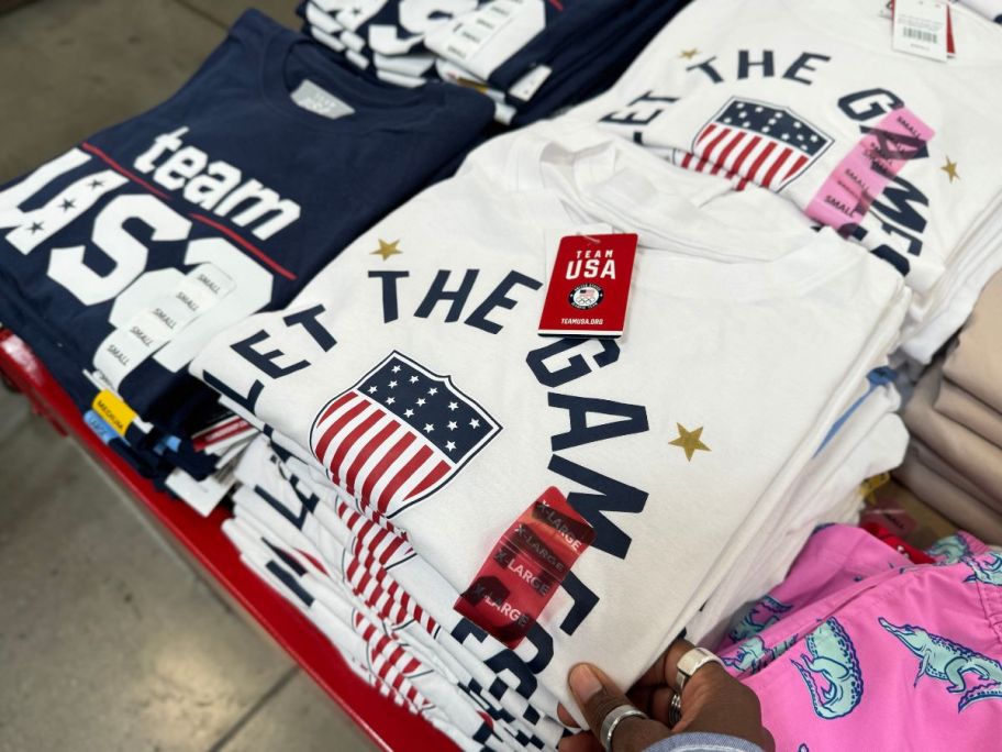 Team USA Ladies Short Sleeve Tees stacked in store on table