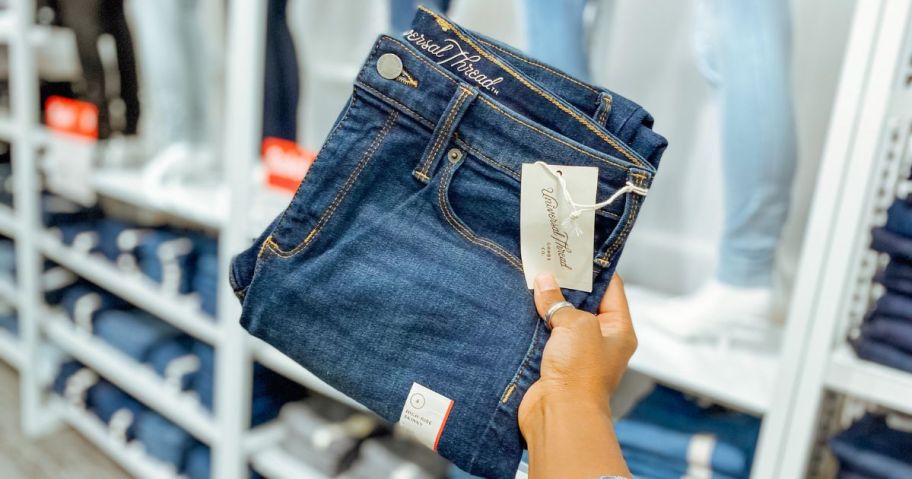 target jeans in hand in store