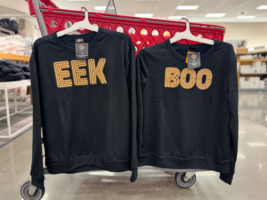 adult pajamas tees hanging on the side of a target cart