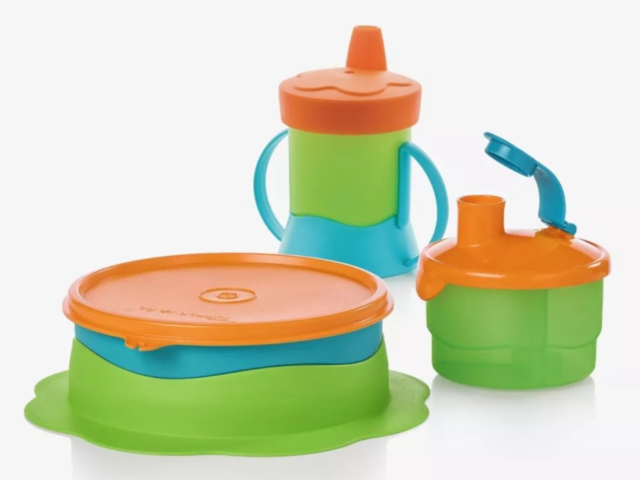 green, blue and orange Tupperware baby feeding set with bowl, sippy cup with handles and snack cup