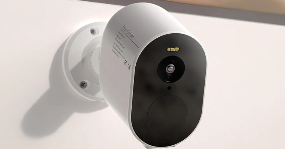 white tenvis camera on wall