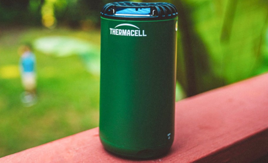 dark green thermacell on table