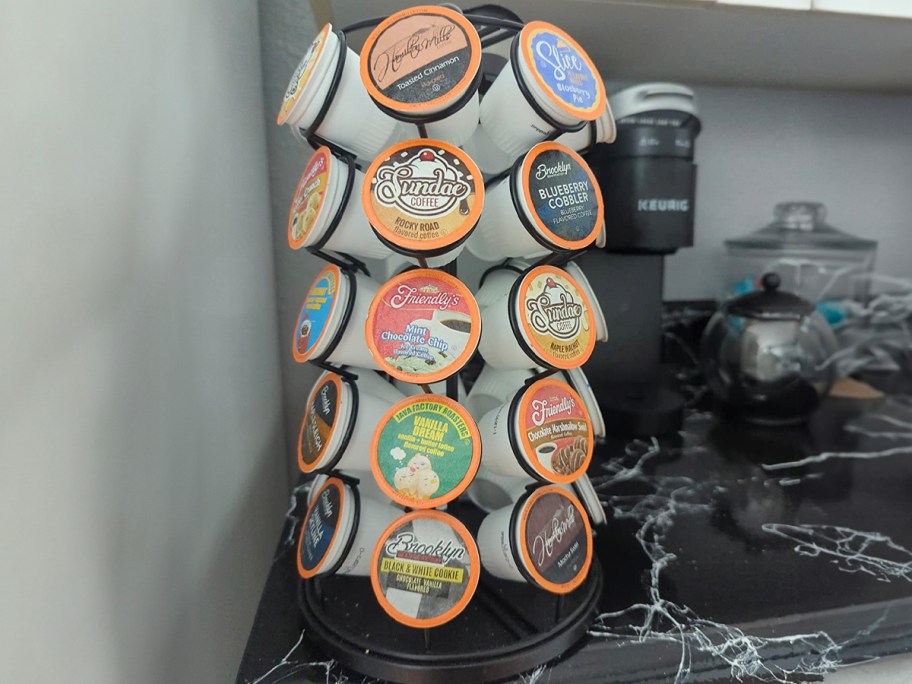 coffee pods on stand on countertop