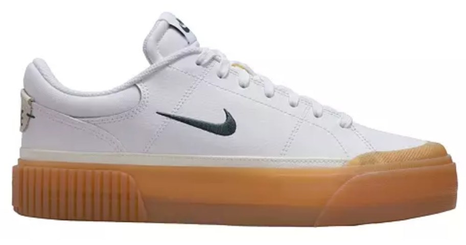 women's white Nike shoe with tan rubber sole