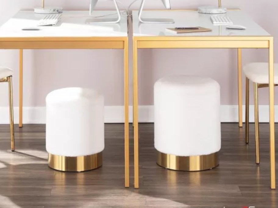 whit and gold round ottomans under desks