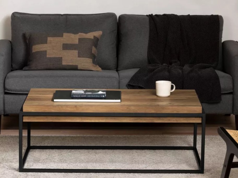 modern style coffee table in front of a grey sofa