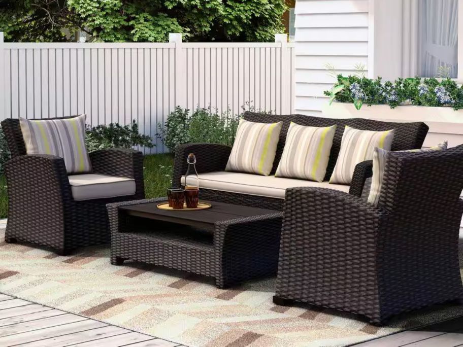 Atlantic Contemporary Lifestyle Atlantic Bradley 4-Piece Black Synthetic Wicker Patio Seating Set w/ Cushions on patio