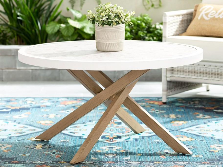 round marble top coffee table on patio