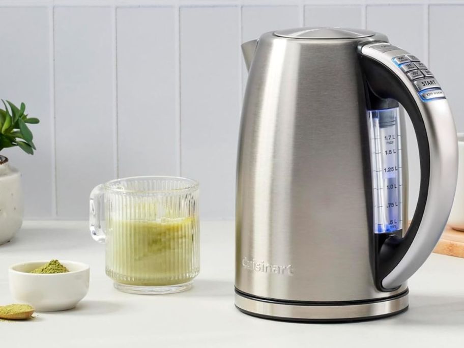 A Cuisinart Electric Kettle next to a cup of Matcha