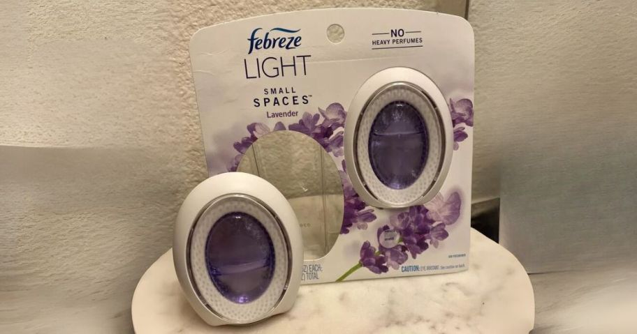 Febreze Light Small Spaces Air Freshener 2-Pack in Lavender on table