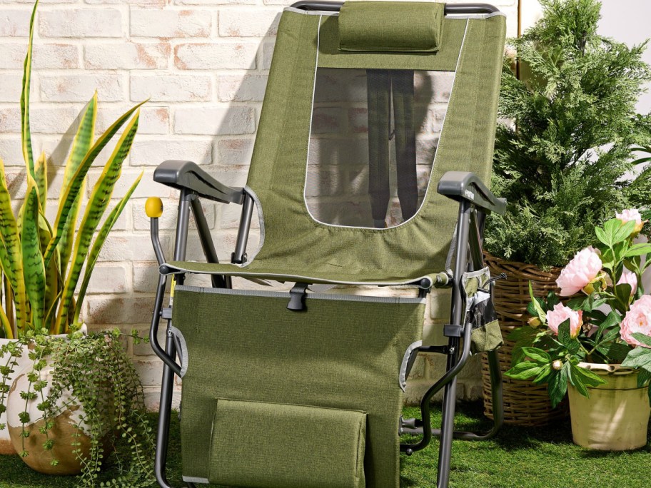 GCI Outdoor Legz Up Folding Lounger w_ Leg Rest on a lawn