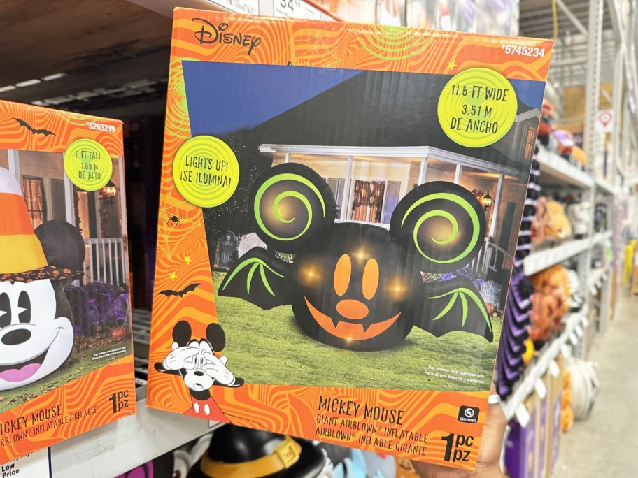 grab grabbing halloween mickey mouse inflatable from shelf