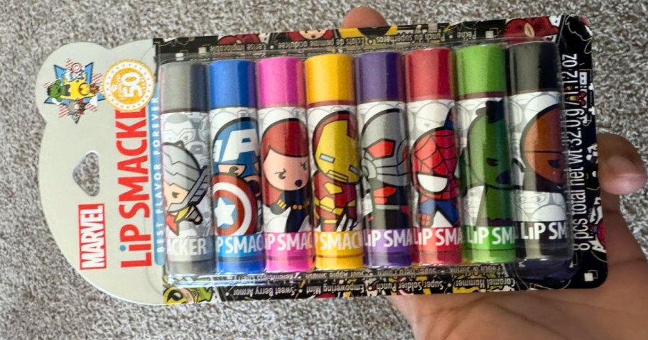 hand holding a pack of Lip Smacker Marvel Avengers Lip Balm