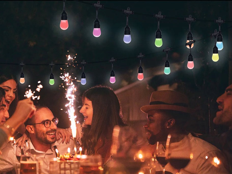 set of multicolor string lights in backyard