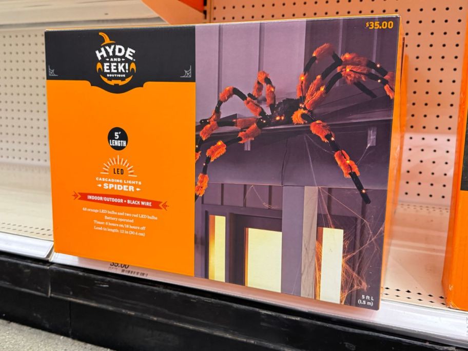 Hyde & EEK! Boutique 5' LED Hanging Spider Halloween Silhouette Light on shelf in store