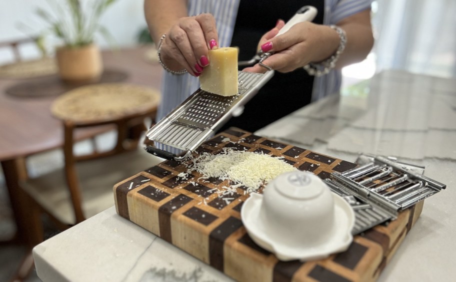 Woman grating cheese using Kitchen HQ 6-Piece Multi-Slice Grater