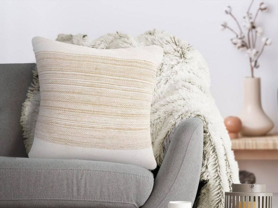 LR Home Border Off White / Beige Jute Woven Band Durable Poly-Fill 20in x 20in Indoor Throw Pillow on couch