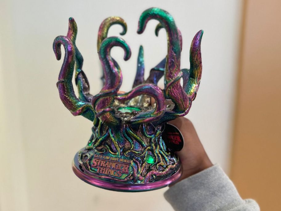 Light-up Tentacle Monster 3-Wick Candle Holder in hand in store