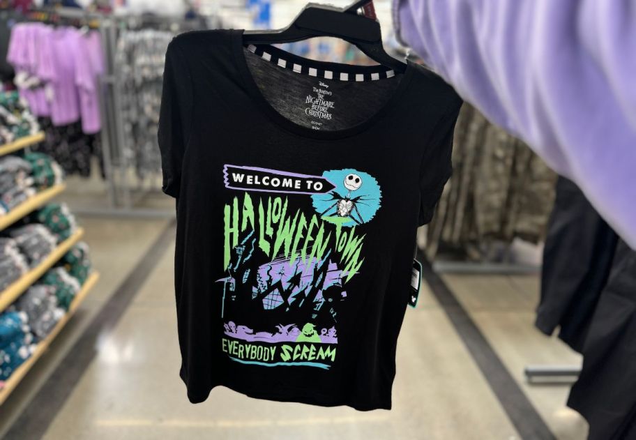 A black nightmare before Christmas sleep tee on a rack in a Walmart store.