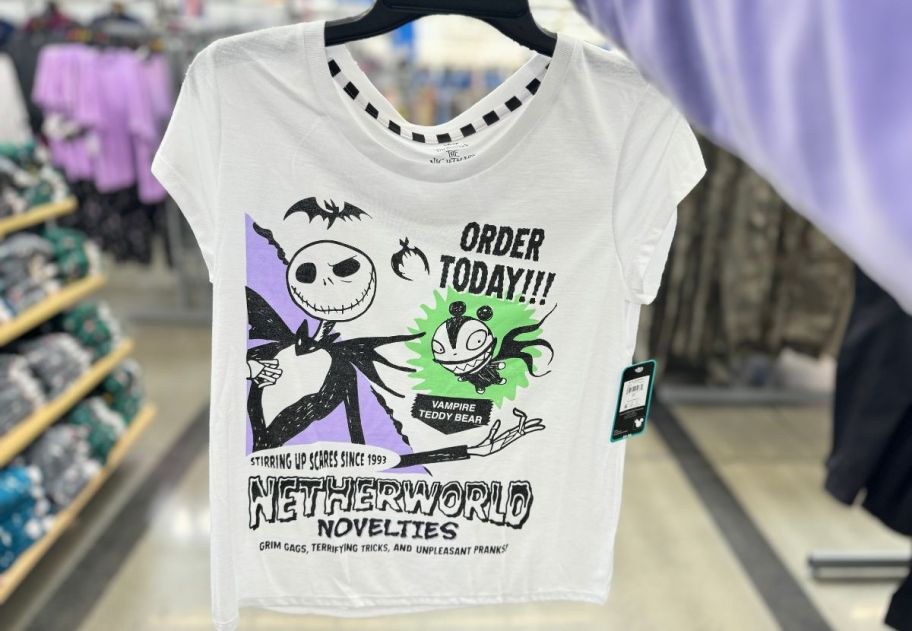 A white nightmare before Christmas sleep tee on a rack in a Walmart store.