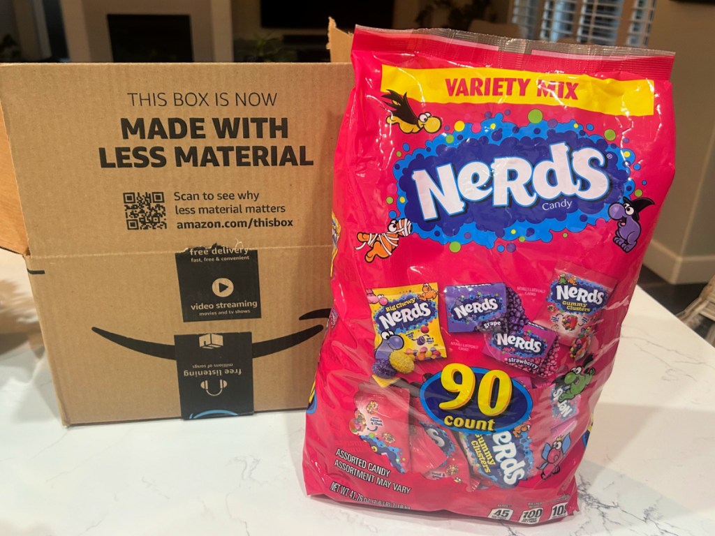 90 count bag of nerds treats next to Amazon box