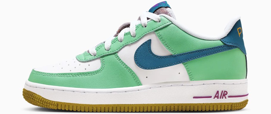 green, blue, and white nike sneaker