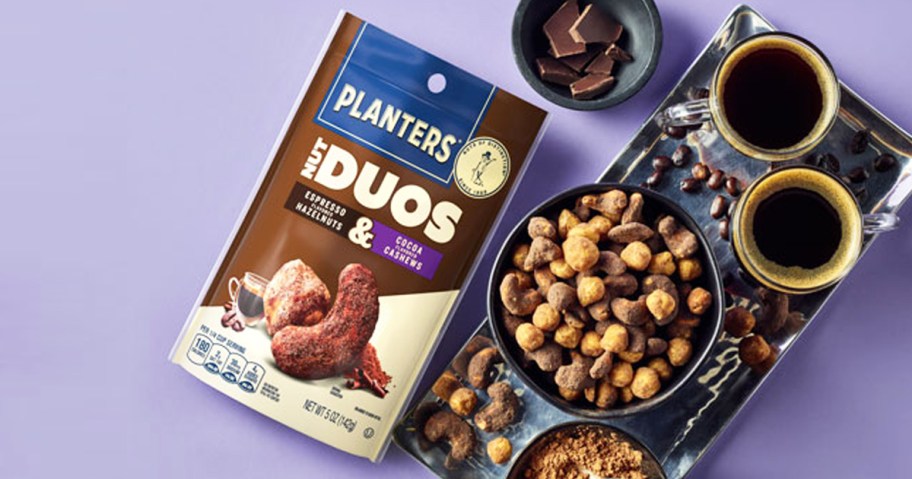 bag and tray of Planters Nut Duos on purple background