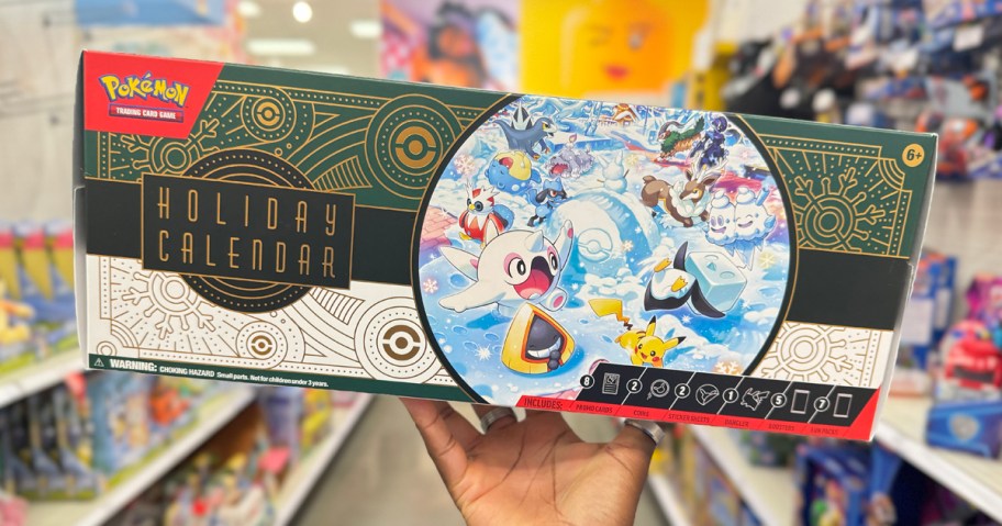 Pokemon Holiday Advent Calendar being held in a Target Aisle 