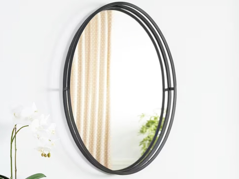 black oval wall mirror