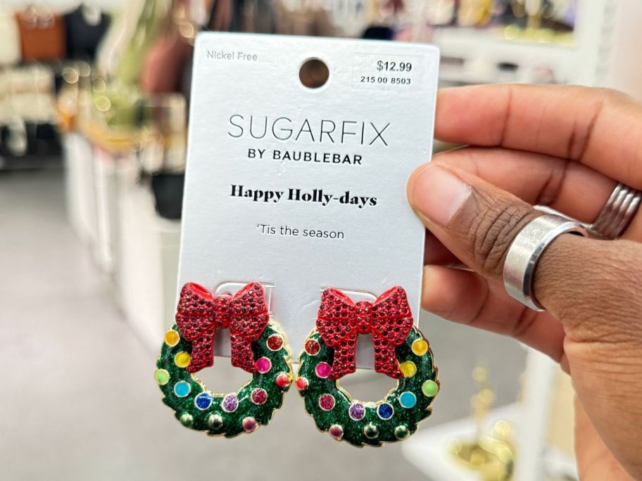 SugarFix by BaubleBar Happy Holly-days Earrings in hand in store